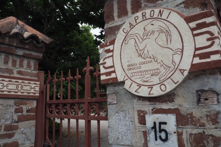 The gates of the old Caproni aeroplane factory.